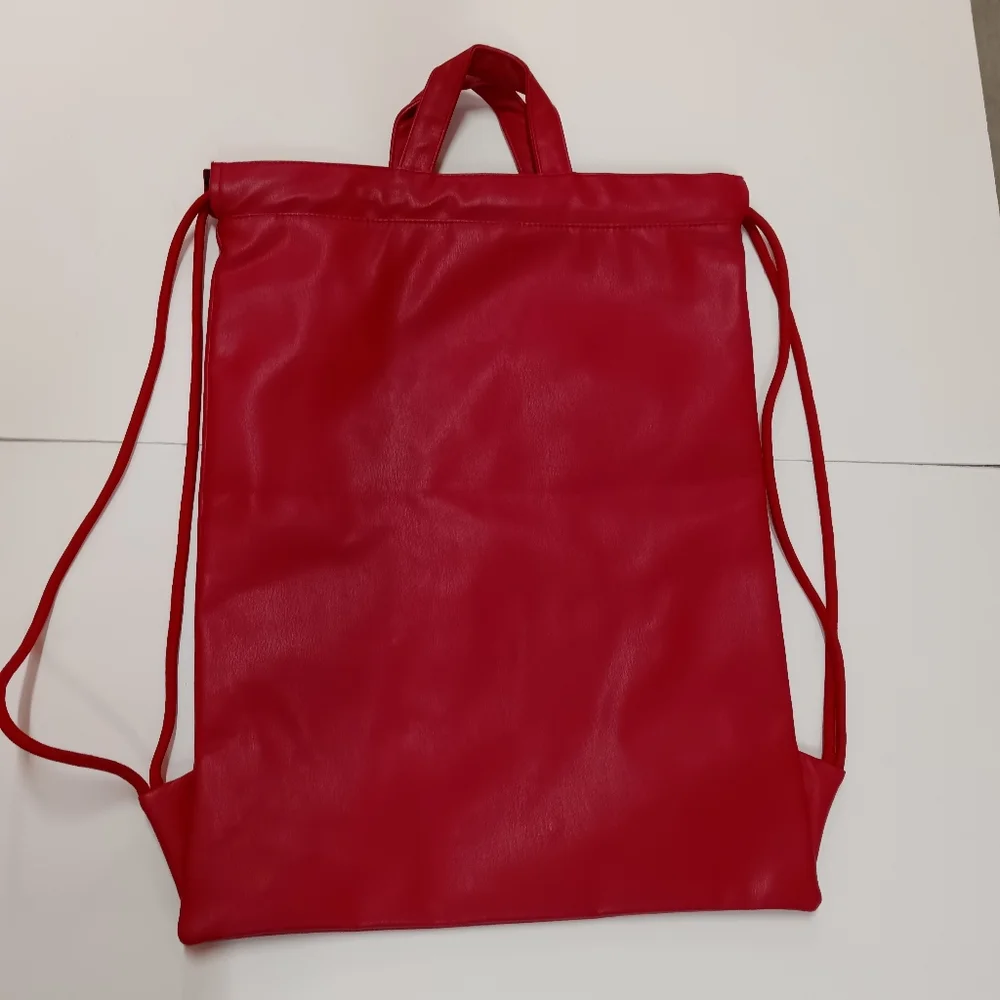 JORDAN Red Faux Leather Drawstring Backpack with Gold Jumpman